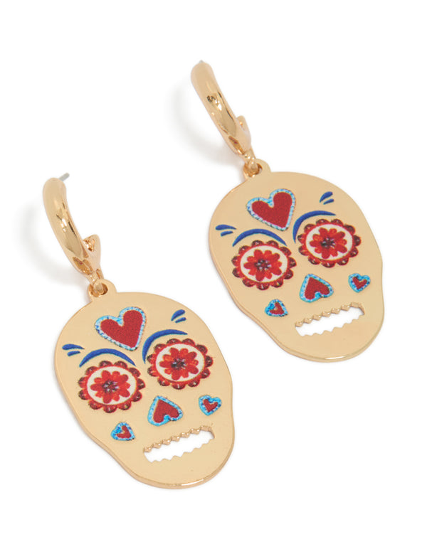 Showcasing fun skull drop earrings featuring floral details, heart accents, and charm elements in gold front view