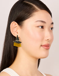 Elegant gold witch hat drop earrings showcasing celestial star and tassel elements on model view - link has visual effect only
