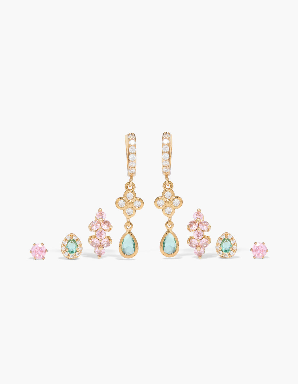 Showcasing a gold aqua and pink cubic zirconia stud and huggie earrings 4-pack featuring floral crystal designs with huggie closures front view