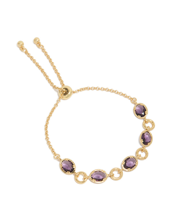 Showcasing a gold plated bracelet featuring cubic zirconia and purple accents front view