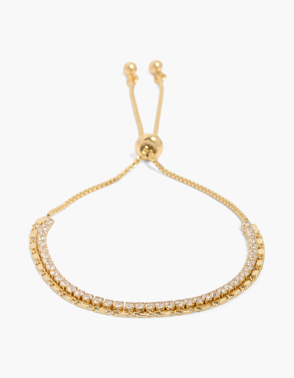 Showcasing a gold plated cubic zirconia layered toggle bracelet with dainty styling front view