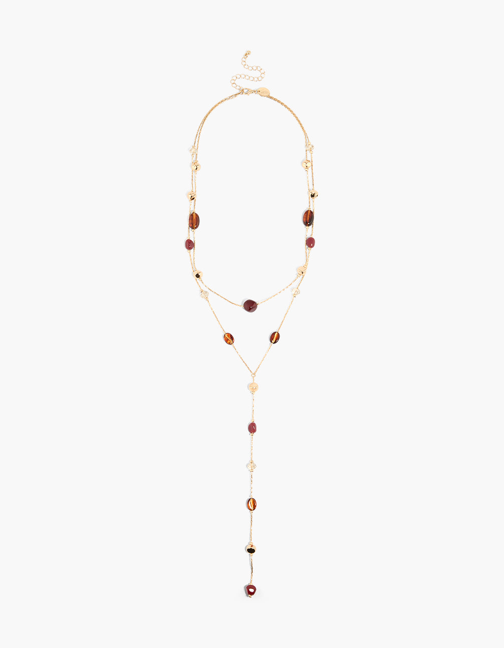 Crafted with beaded stations in gold, this Y necklace features acrylic elements and statement styling front view