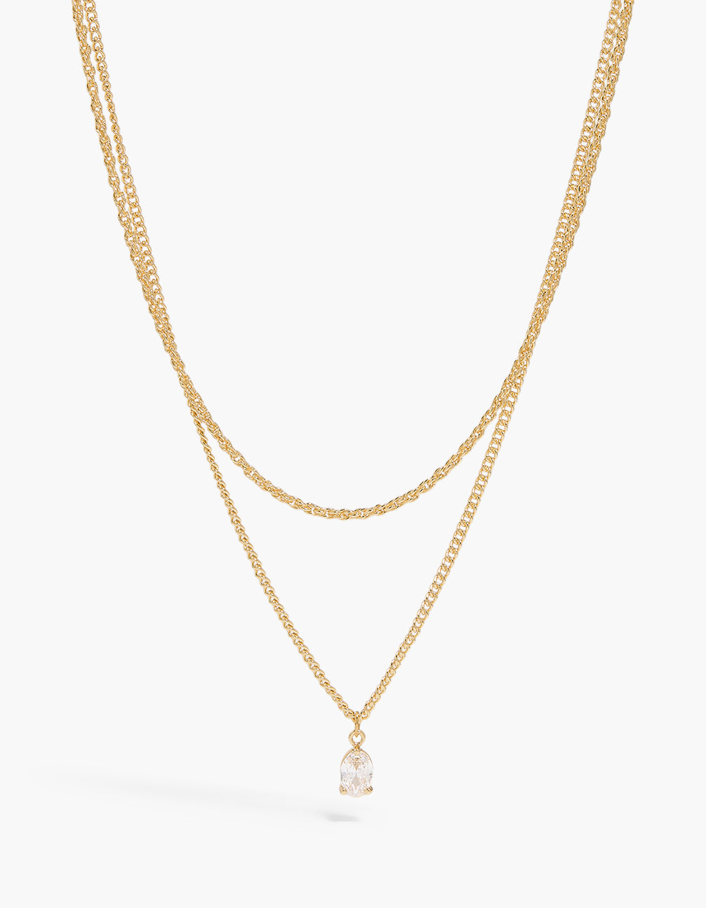 Showcasing a gold plated oval cubic zirconia and twisted chain necklaces 2-pack with pendant features close up view