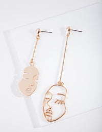 Gold Mismatched Face Earrings - link has visual effect only