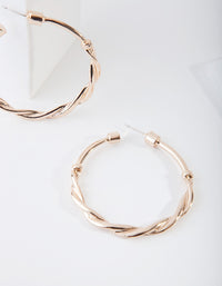 Gold Twist Metal Hoop Earrings - link has visual effect only