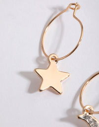 Gold Star & Moon Huggie Earrings - link has visual effect only